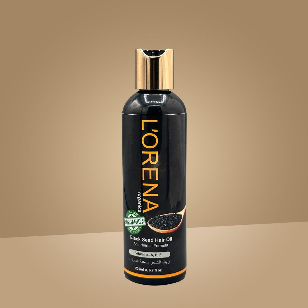 Lorena black seed hair oil bottle on a beige background