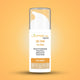 Lorena Organics DE-TAN Face Wash bottle on a gradient orange background