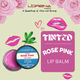 Lorena Organics Tinted Rose Pink Lip Balm with decorative elements on a light green background