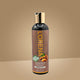 Lorena Almond Hair Oil bottle on a beige background