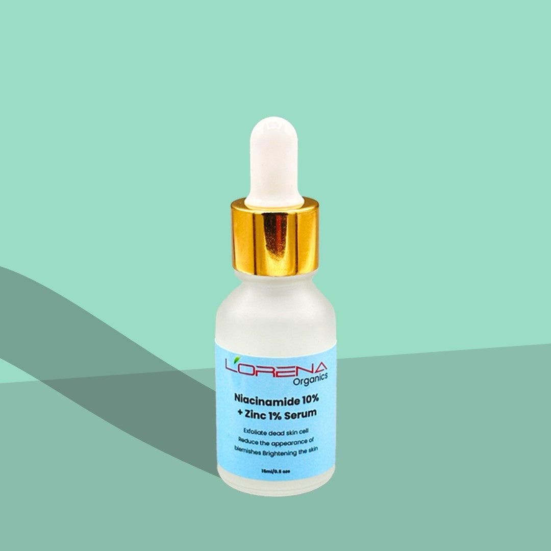 L'orena Organics  Niacinamide 10% + Zinc 1% Serum bottle with dropper on a green background